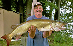 21.5 lb., 45" Musky caught in the river at Pine Crest Campground!